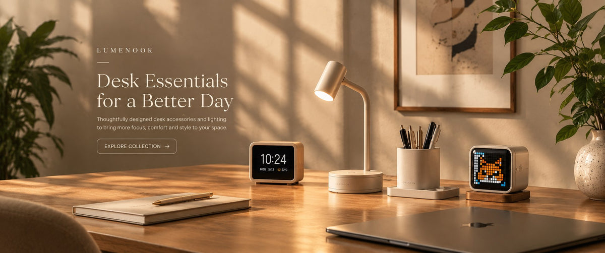 Lumenook desk essentials: a warm desk with a lamp, clock, pen pot and pixel speaker